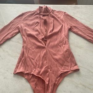 Pink low v-cut Reformation bodysuit